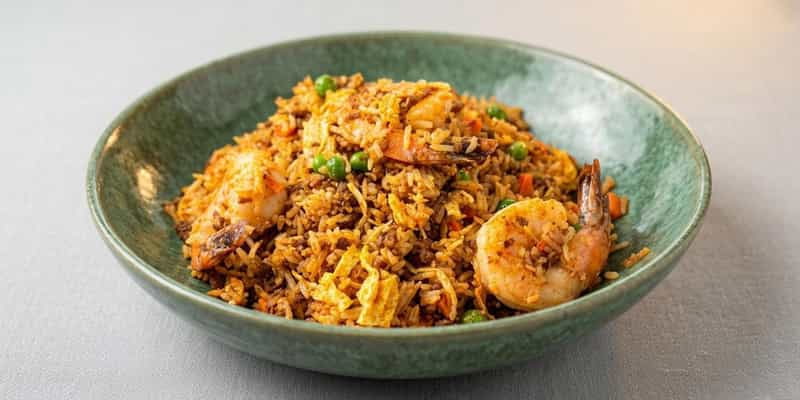Shrimp fried rice with peas and carrots