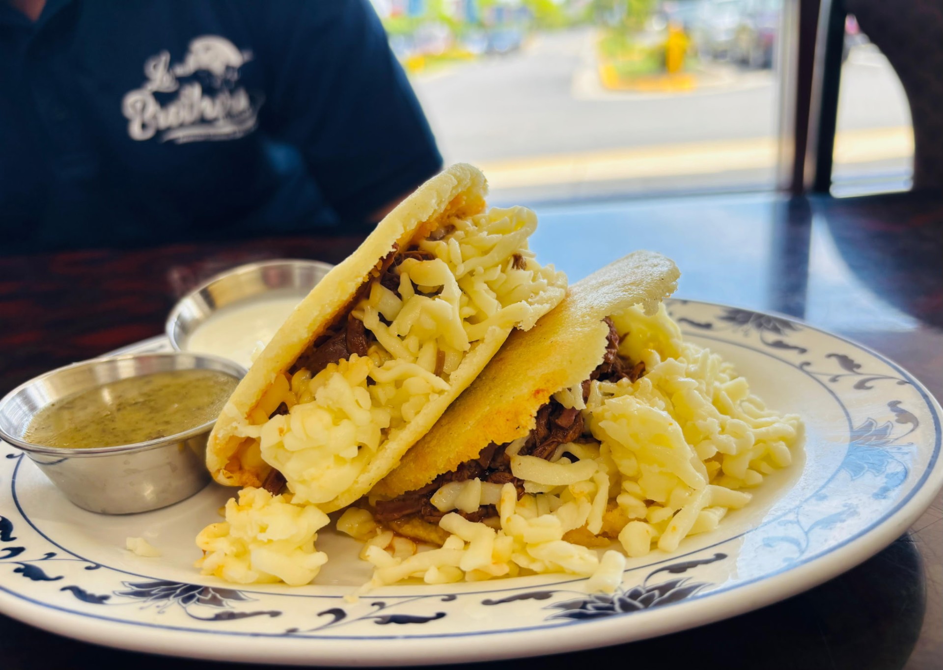 Arepas stuffed with shredded beef and cheese